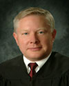 The Honorable Michael L. Howard, Retired