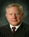 The Honorable Michael L. Howard, Retired